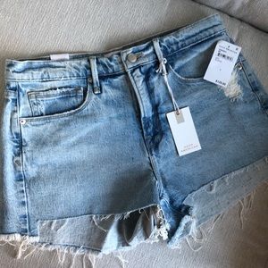 Good American “Good '90s Short in Blue650” size 4. New with tags.